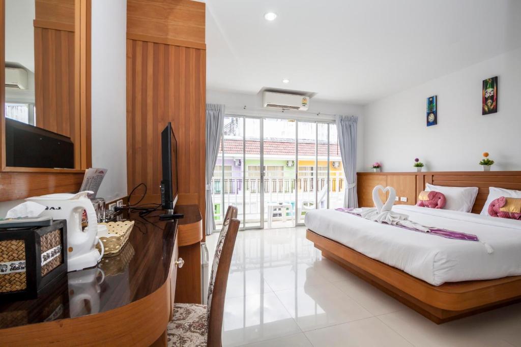 Larn Park Resortel Patong Habitación foto