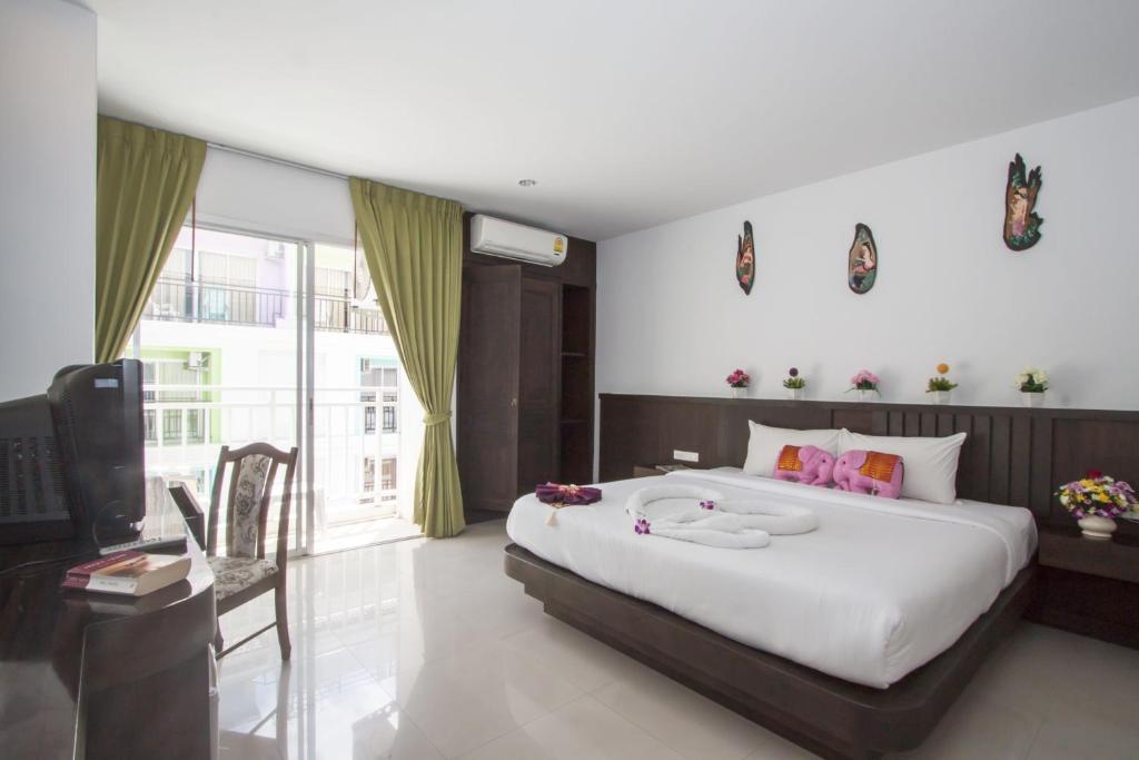 Larn Park Resortel Patong Habitación foto